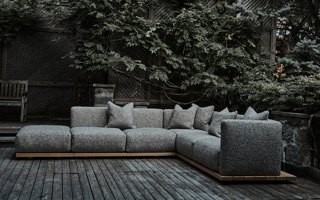 Montauk grey, L-shaped sofa sitting outside